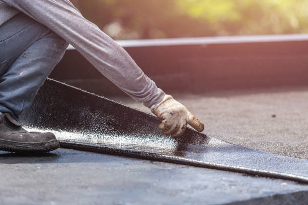 Professional Exterior Waterproofing technician working in Saint James, NY